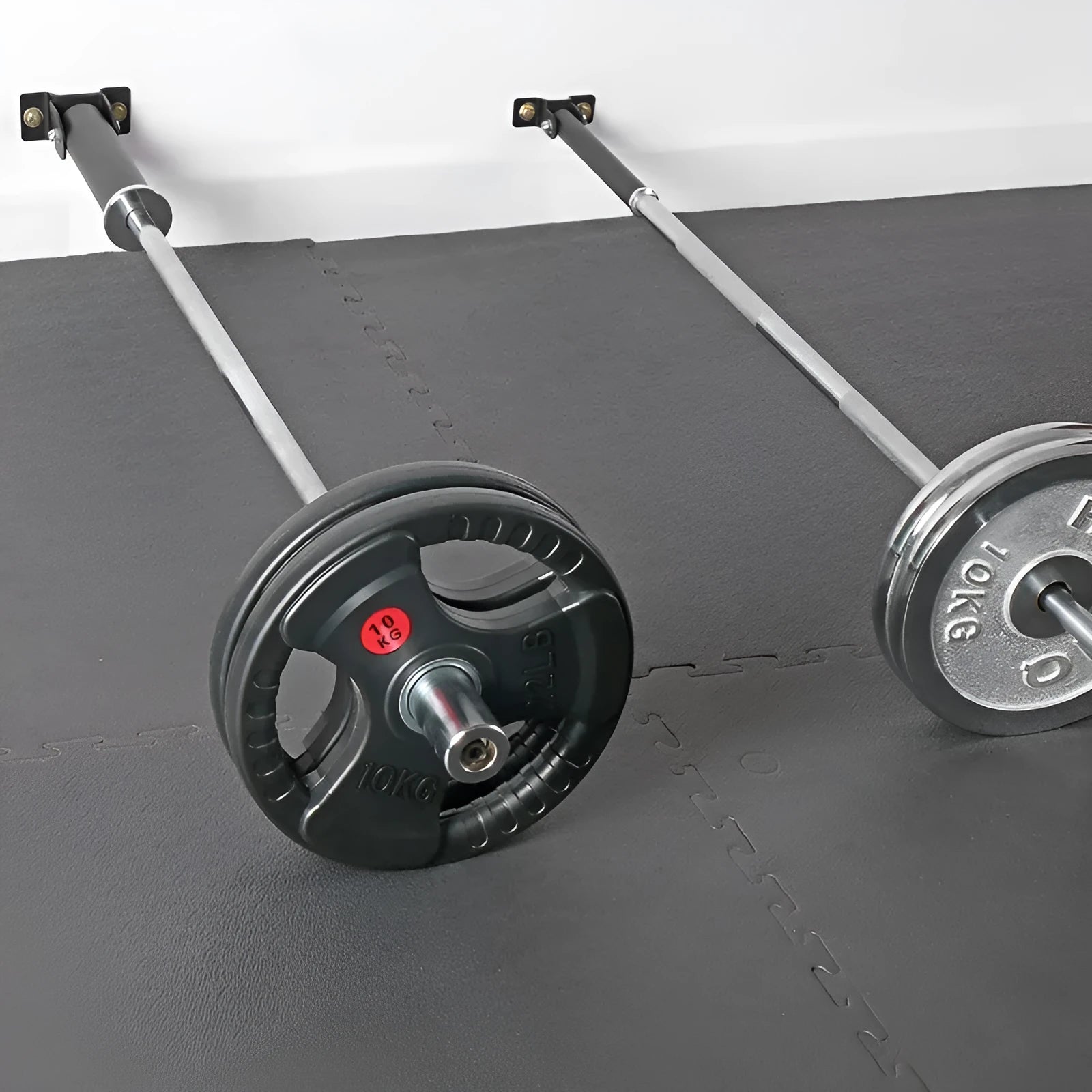 Wall-mounted steel rack with 25 tubes for storing barbells or rods.
