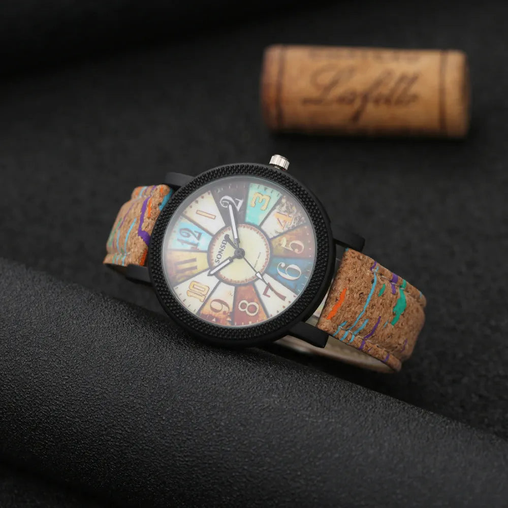 Casual vintage women's watch with brown leather strap and silver 37mm round dial.