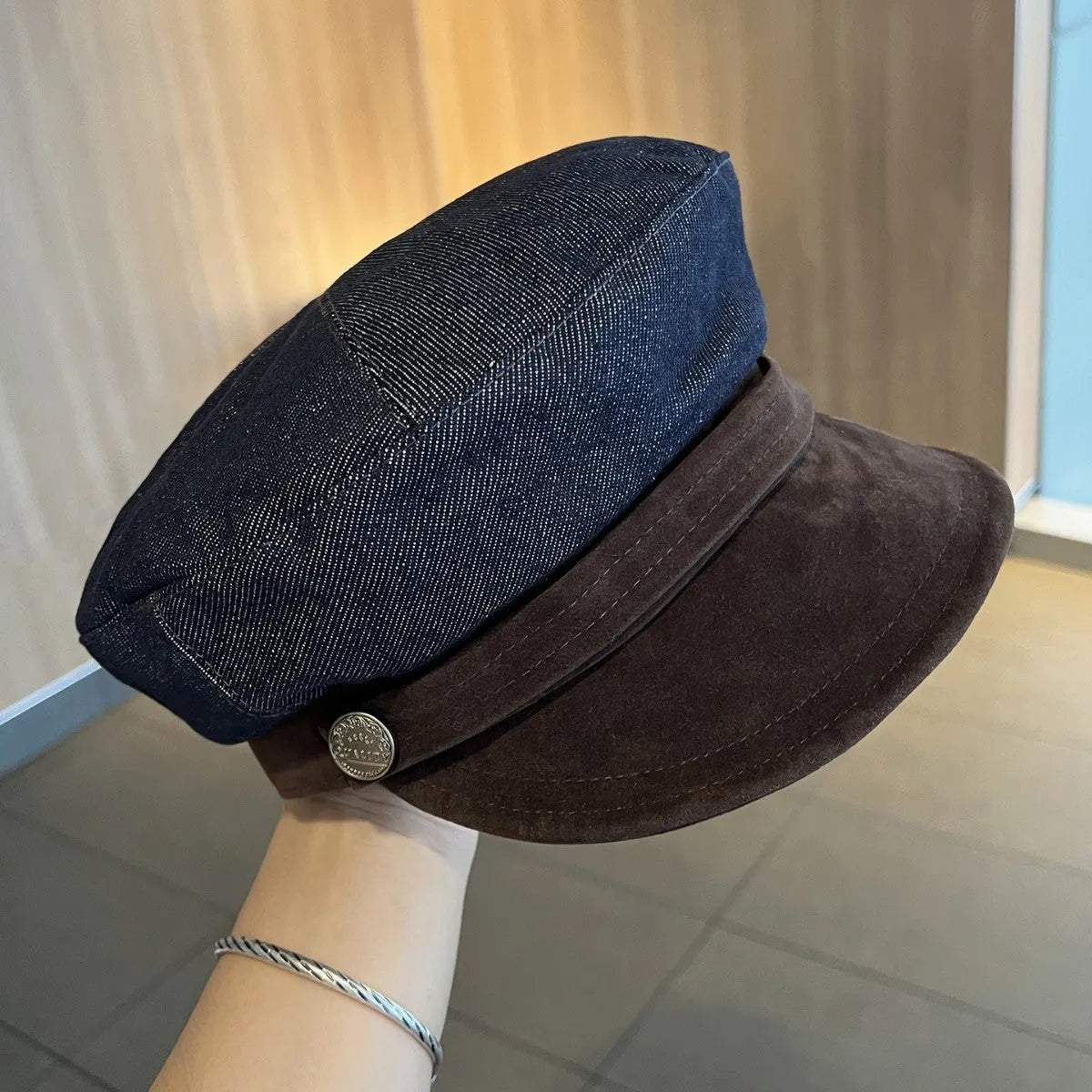 Dark blue denim octagonal newsboy hat with adjustable sizing for 54-58cm head circumference