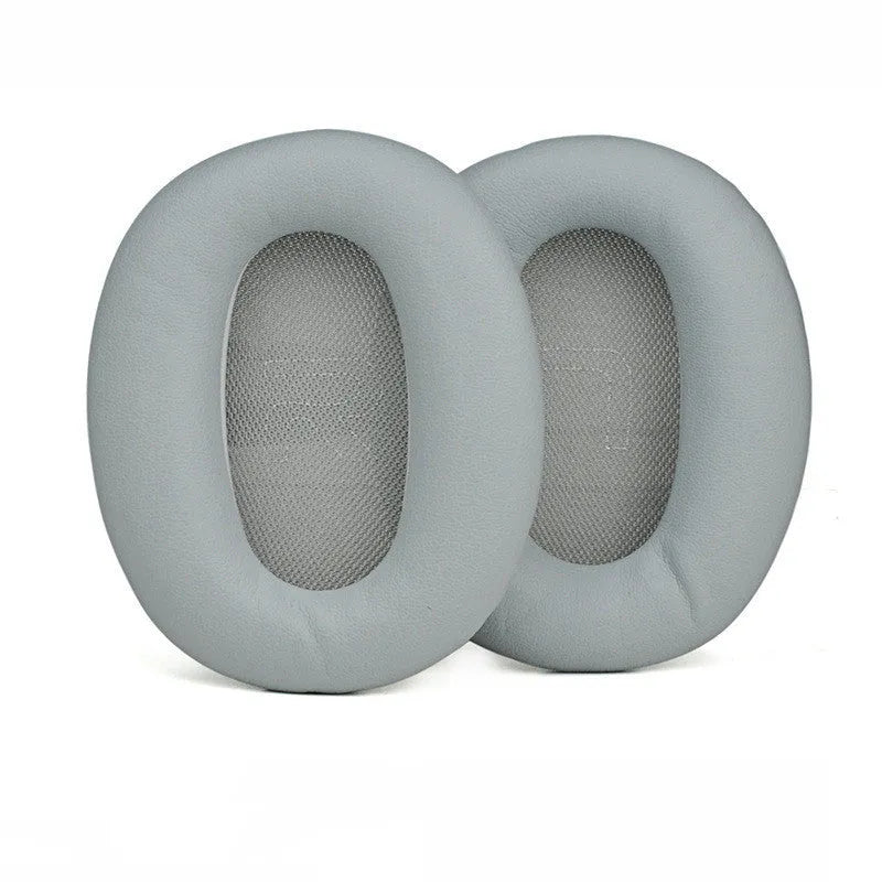 Pair of black protein skin earphone replacement cushions for Walker W820BT headphones on a white background