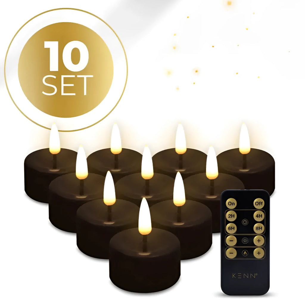 Set of four black S10 LED tealight candles showing flickering flame effect.