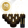 Set of four black S10 LED tealight candles showing flickering flame effect.