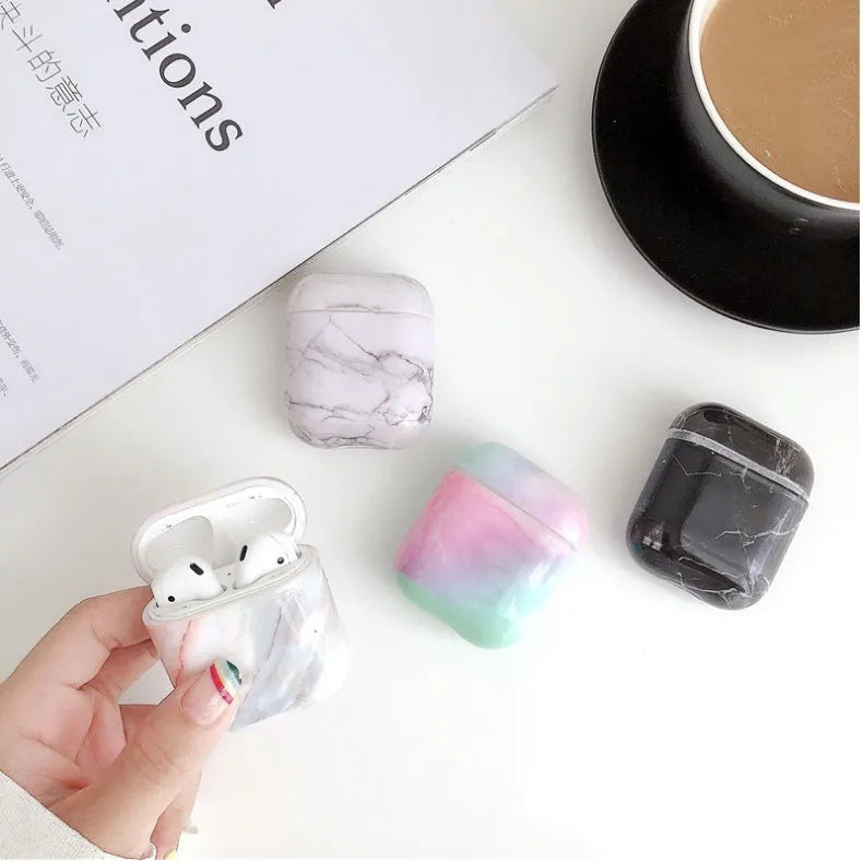 White marble pattern hard PC protective cover for Apple AirPods charging case.