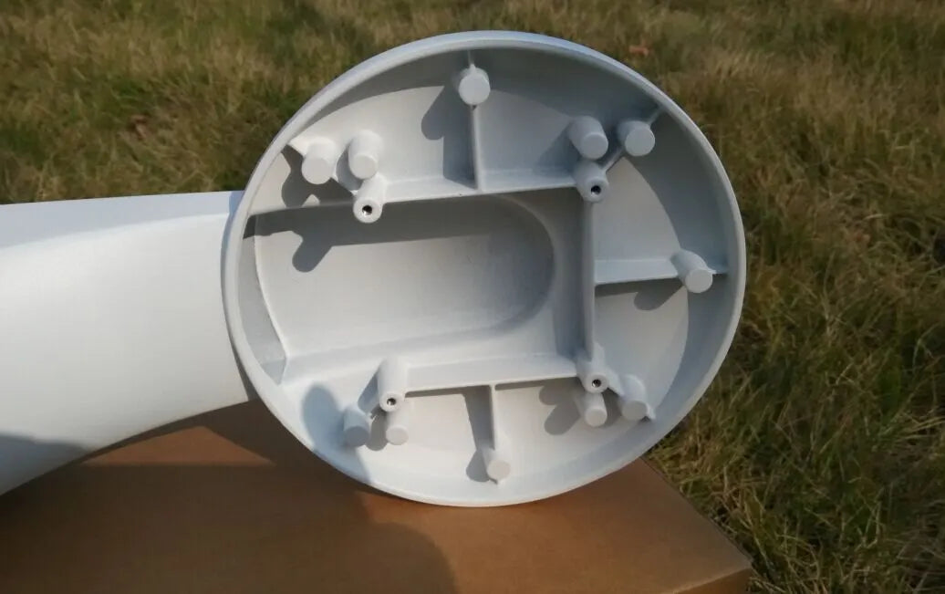 White aluminium alloy and ABS dome camera wall mount bracket on a white wall