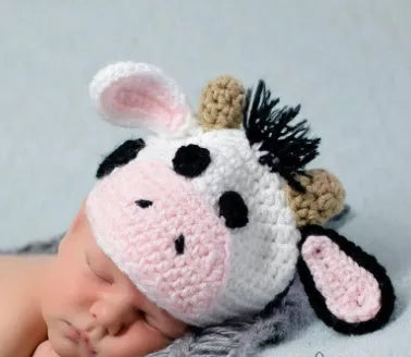 White hand knitted baby cow suit with hat and pants in wool and cotton