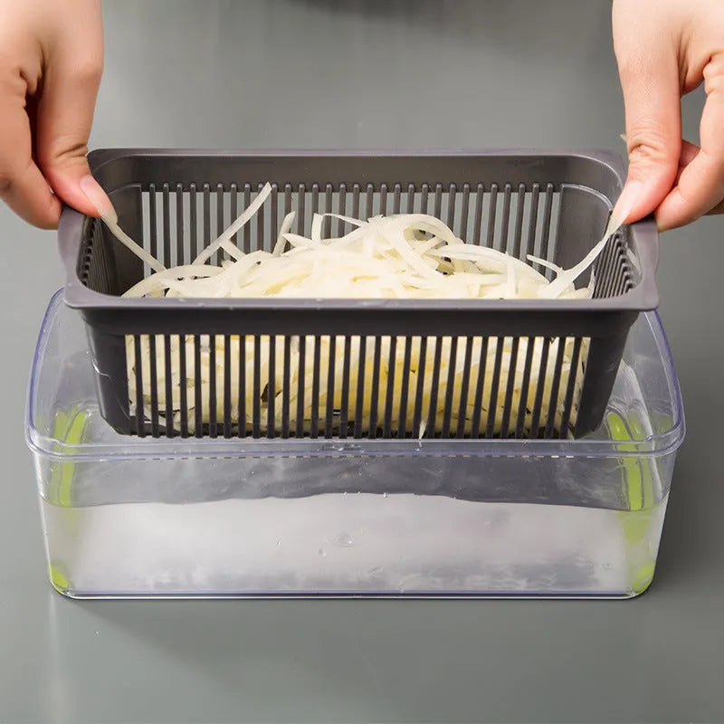 Multifunctional vegetable cutter with 7 stainless steel blades on a kitchen counter, compact 31.8 x 11.5 x 11.5 cm size