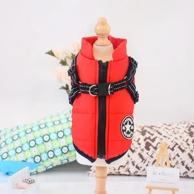 Waterproof dog coat with integrated harness in red, navy blue, and army green colours for winter.