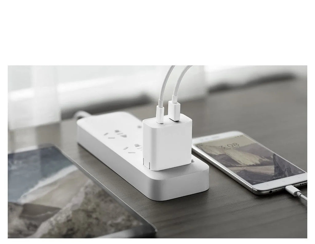 Xiaomi 30W USB charger, white, dual port USB-C and USB-A, compact 48mm x 28mm x 47mm