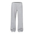 Men's solid colour cotton straight leg trousers with a loose wide-leg casual fit on a hanger.