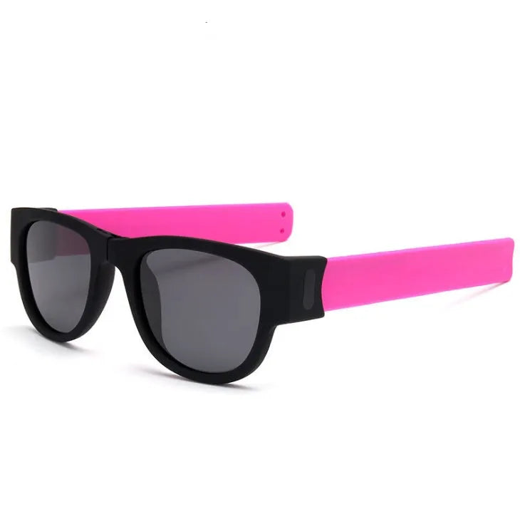 Folding bracelet sunglasses with polarized UV400 resin lens on wrist, black colour
