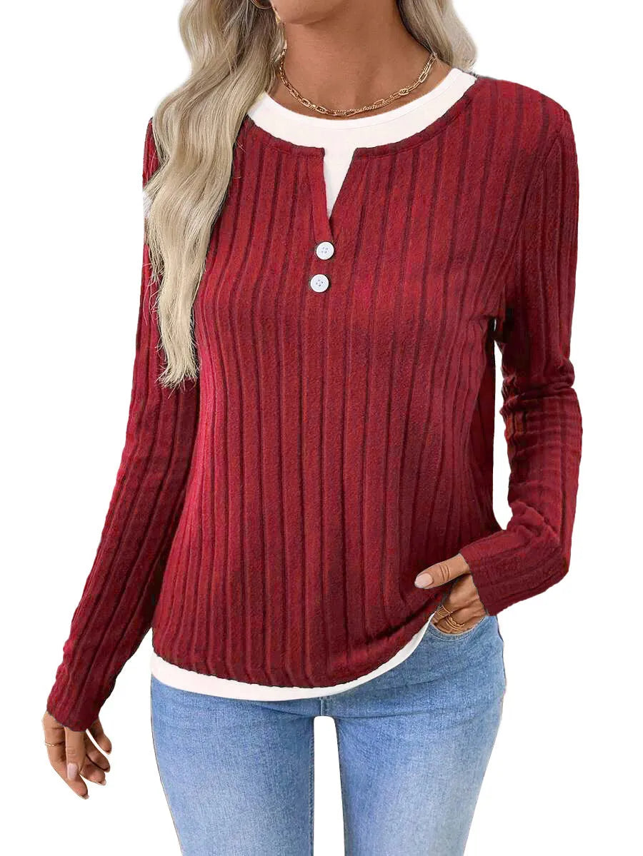 Women's black fake two-piece round neck pullover sweater with concave stripe texture and button details.
