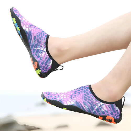 Men's and women's beach wading shoes in blue, with Lycra upper and EVA midsole, on a sandy background.