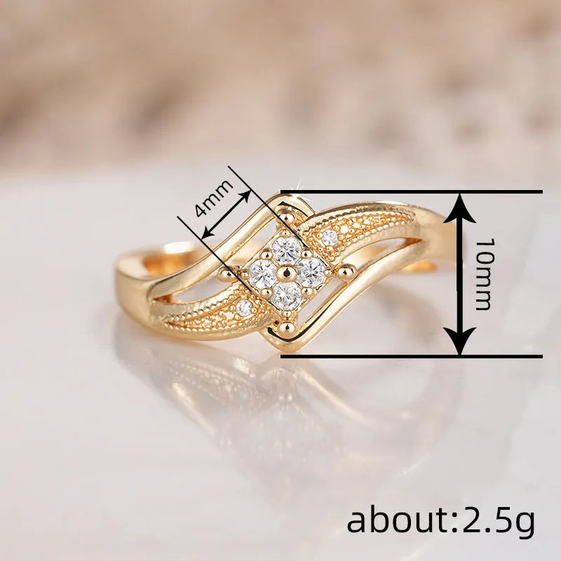 Yellow gold copper women's ring with diamond shape and micro inlaid zircon ornamentation.