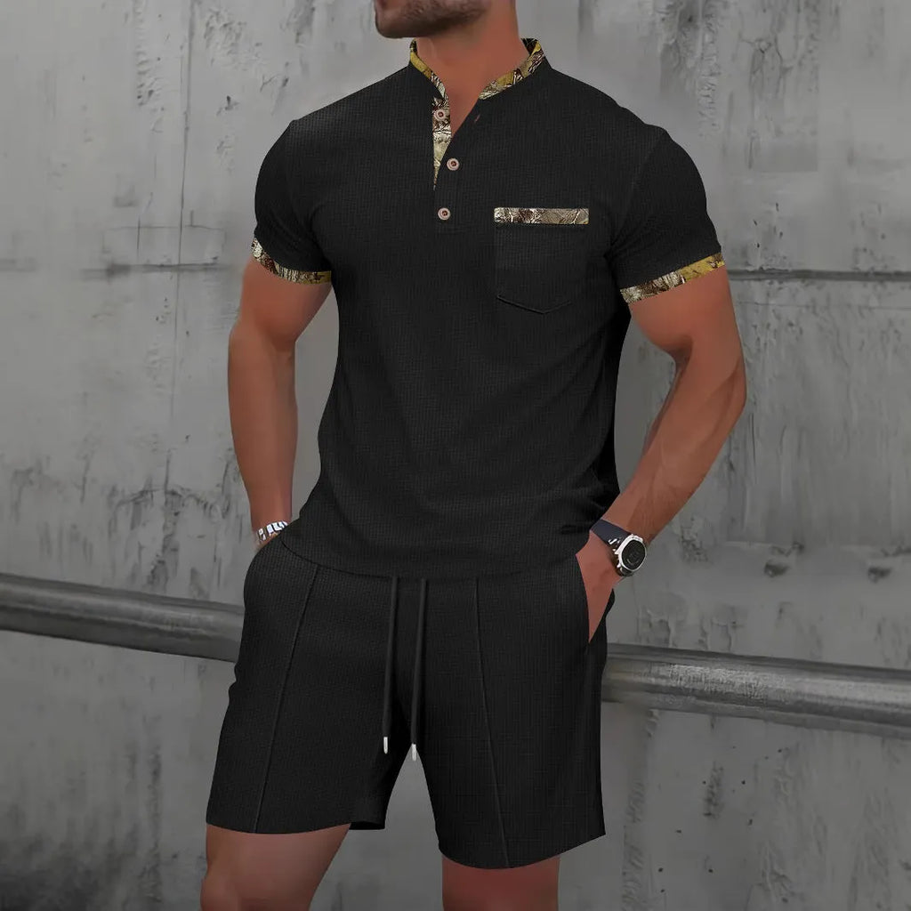 Men's grey waffle texture short sleeve zip-up polo suit with matching shorts laid flat.