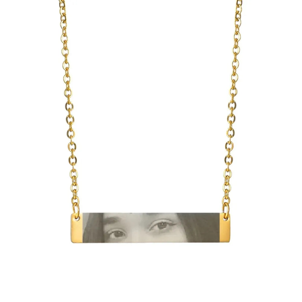 Custom stainless steel photo necklace with engraved eye design, geometric shape, and electroplating finish in a range of colours