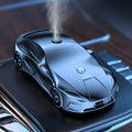 Grey car model aromatherapy diffuser in aluminium alloy, 12.9 cm x 5.9 cm x 3.7 cm, 30ml capacity, with three essential oils