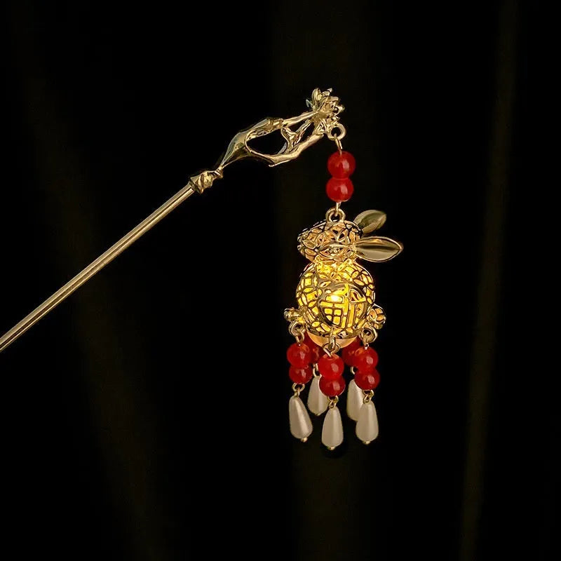 Light-emitting ancient style hairpin with dangling wind chime ornament, crown shape, electroplated alloy, pearl accent options.