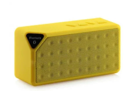 Small cube-shaped Cannon X3 portable Bluetooth speaker and radio in multiple colour options