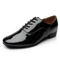 Men's black indoor dance shoes with a synthetic leather upper and calf leather sole.