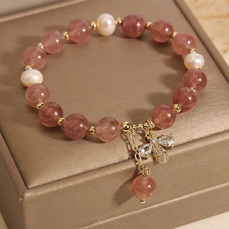 Freshwater pearl and strawberry quartz bracelet with zircon accents and bee charm