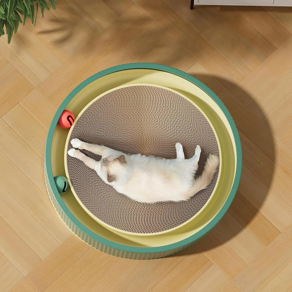 Large green circular cat scratching board with ball track and plush ball toy in the centre.