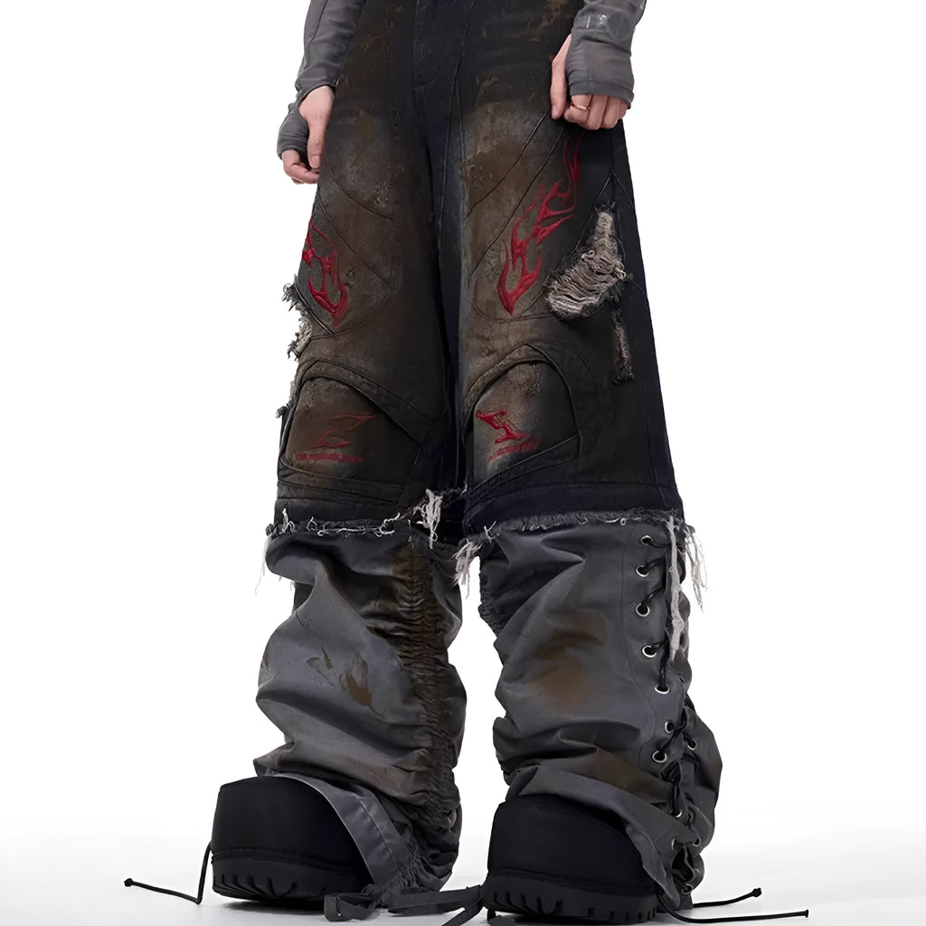Man wearing grey retro jeans with detachable legs in a wide-leg loose fit.