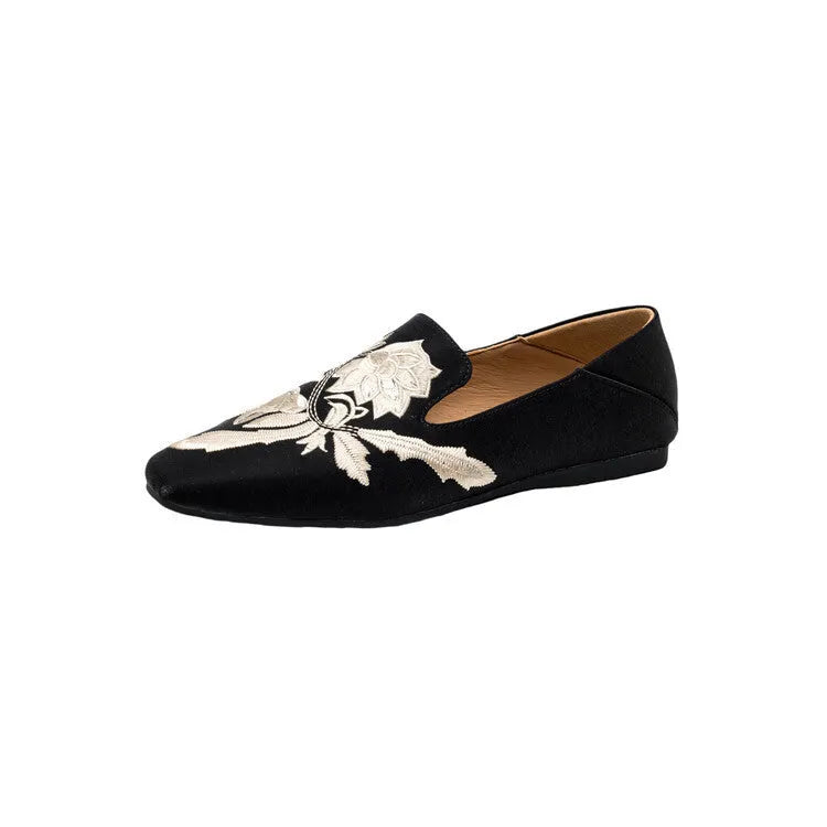 Women's beige retro flat pumps with embroidery detail, round toe, and a low-cut design on a soft bottom.