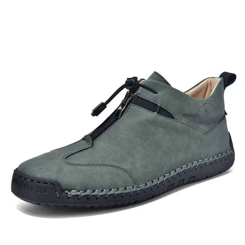 Men's casual leather shoes in green with round toe, rubber sole, and mid heel.