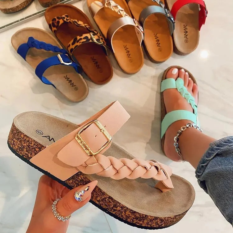 Women's cork flip flops with cow suede upper, decorative stitching, and rubber sole in blue shade