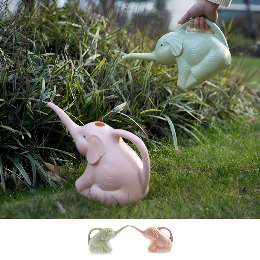 Pink children's watering can shaped like a sitting elephant with a long spout and baby-bottle handle.