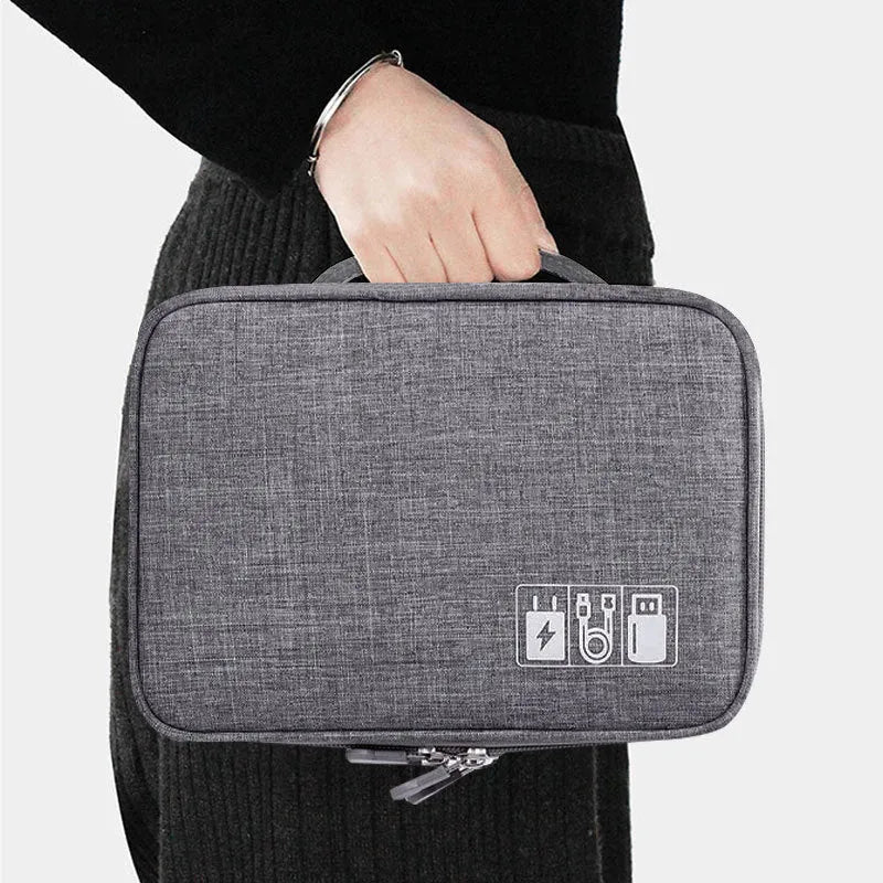 Grey waterproof double-layer travel cable organizer bag with portable handle and multiple pockets