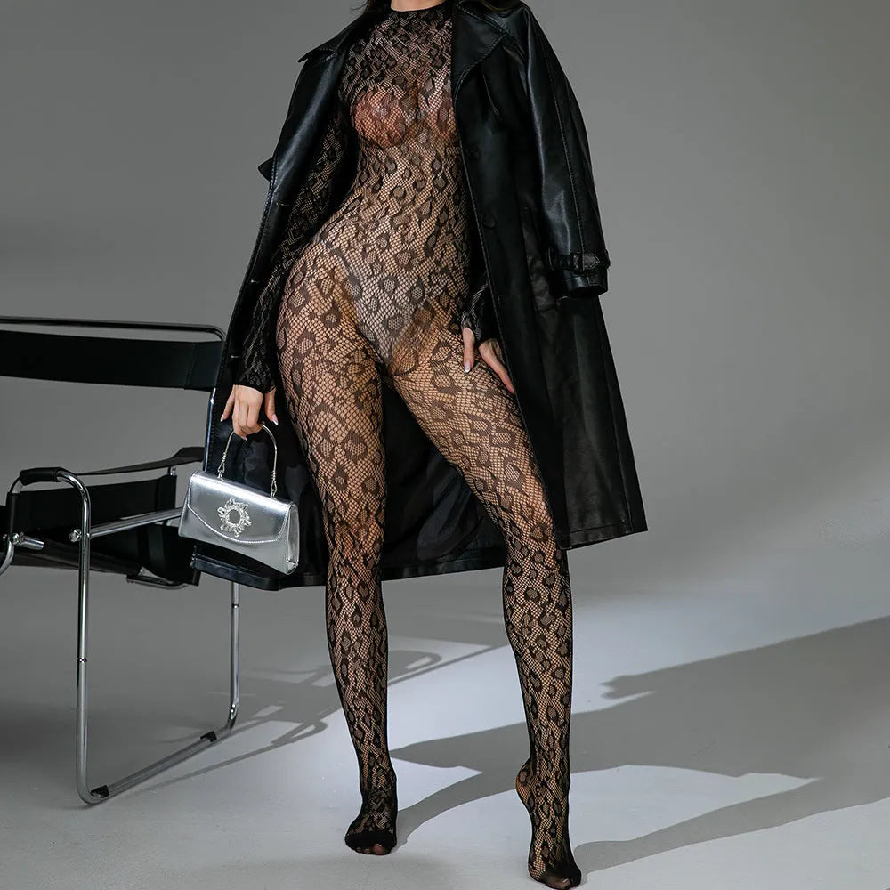 Black fishnet lingerie bodysuit with long sleeves and backless jacquard detail