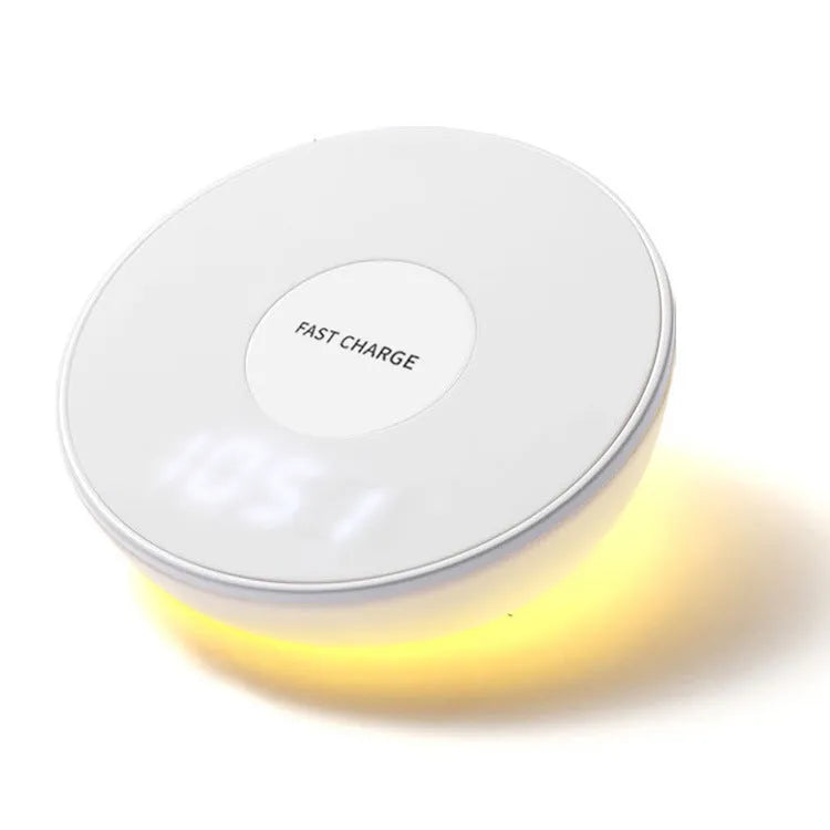 White wireless phone charger with clock display and control buttons on front