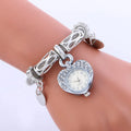 Ladies Love bracelet watch with 2.6cm dial, 23.5cm strap, 50g, in golden or silvery finish