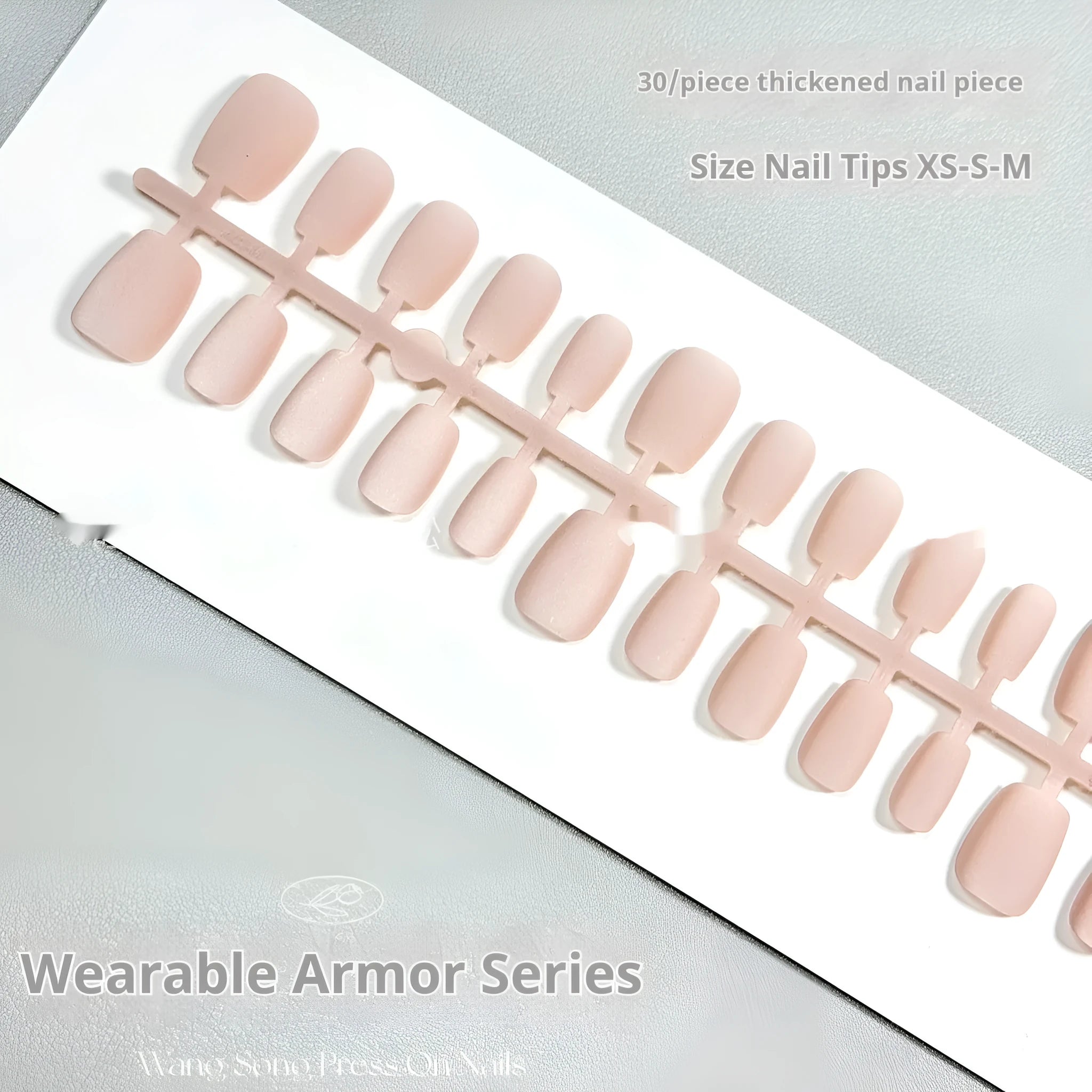 Set of frosted velvet Cat's Eye artificial nail tips in short ladder sizes on a display card.