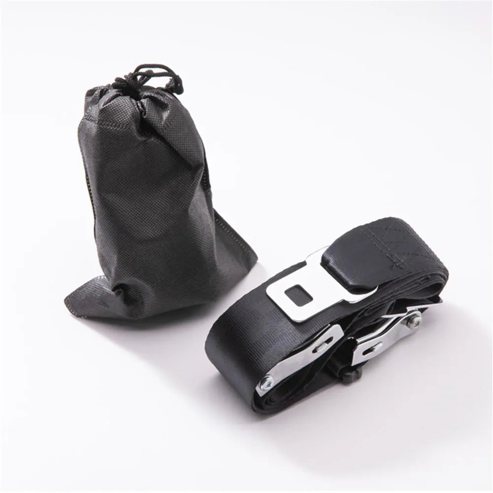 Black polyester pregnancy seat belt extender with double aircraft buckle installed on a car seat