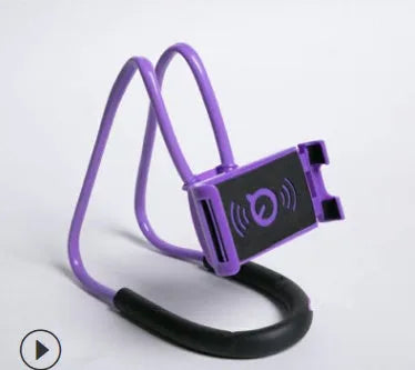 White plastic and foam 360-degree rotatable universal phone holder on a table.
