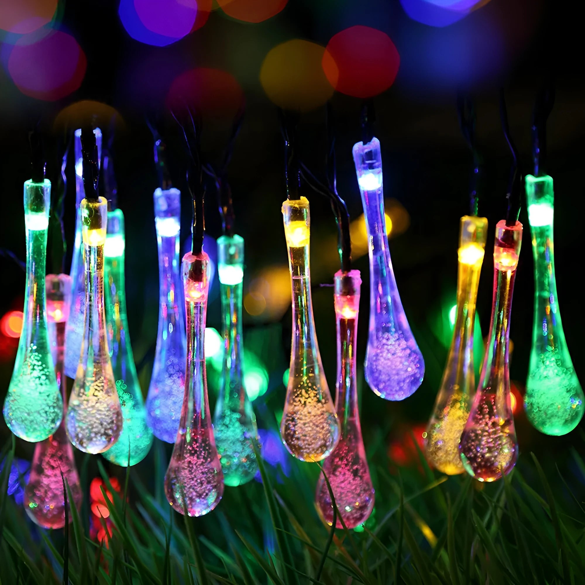 Solar-powered outdoor string lights with water drop shaped pendants on a 6.5 metre cable.