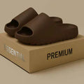 Women's thick sole beach slippers in black, green or brown with EVA injection-moulded construction