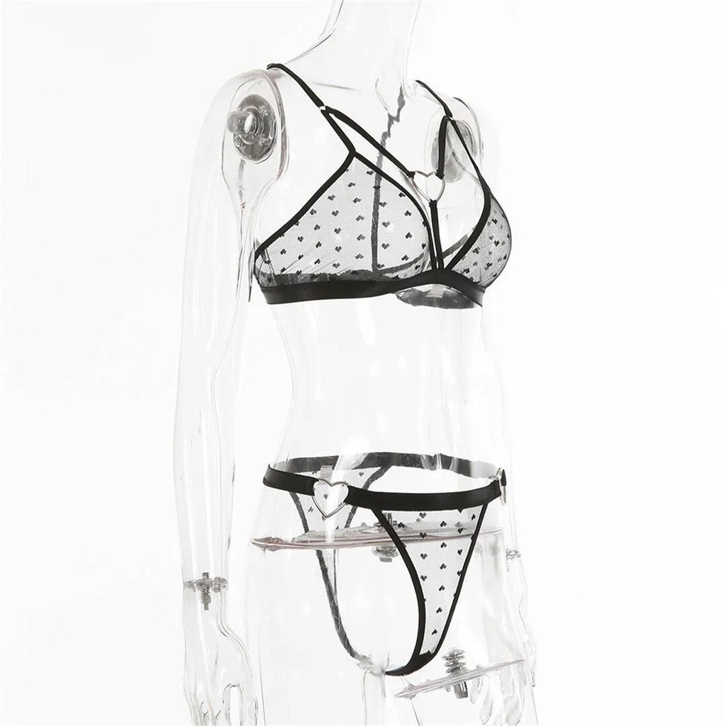 Ladies black mesh three-point design two-piece set with top and trousers on a hanger.