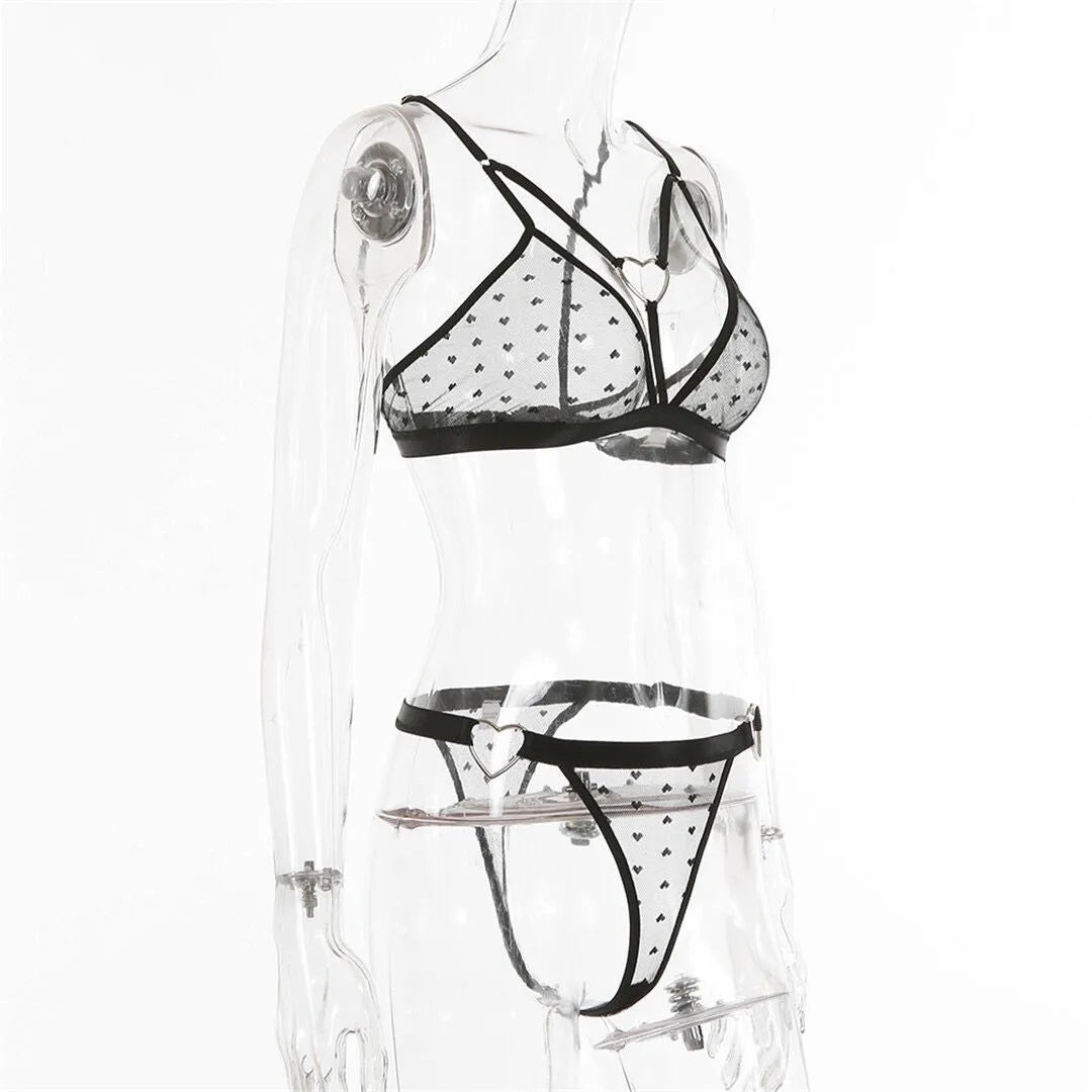 Ladies black mesh three-point design two-piece set with top and trousers on a hanger.