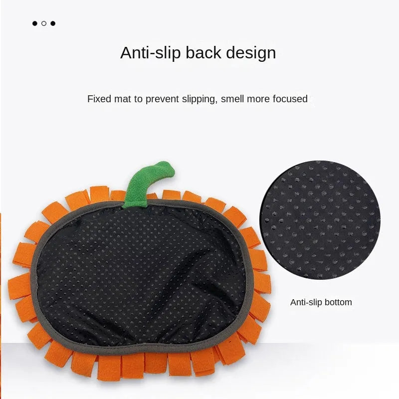 Orange pumpkin-shaped dog sniffing mat with a textured fur-like surface for slow feeding and enrichment.