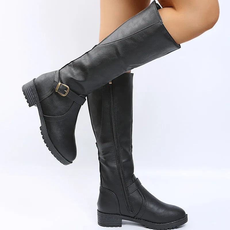 Women's black knight boots with square heel, round toe, and buckle detail on a high cylinder shaft.