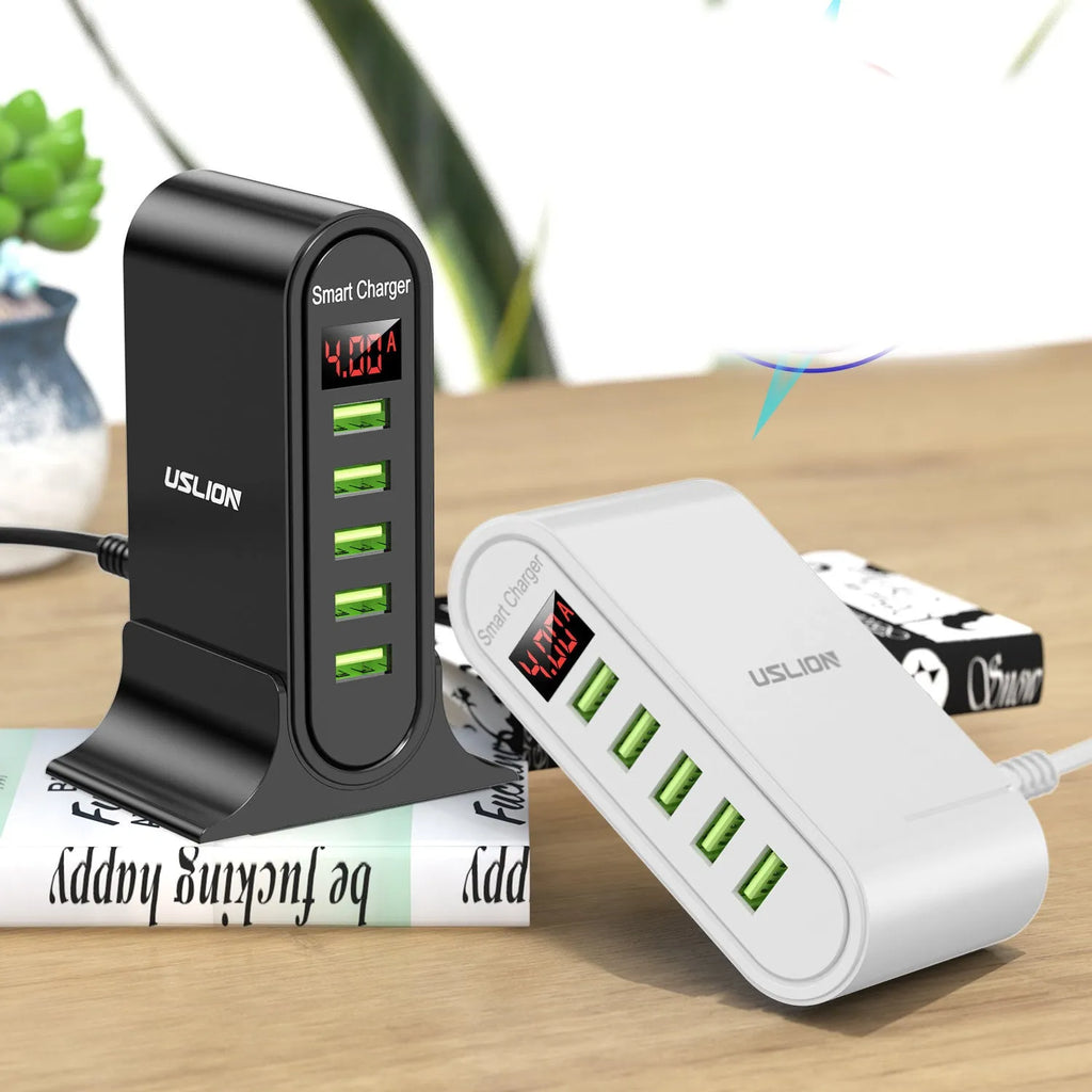 Black and white smart USB charger with LED digital display, showing EU, UK, and US plug variants.