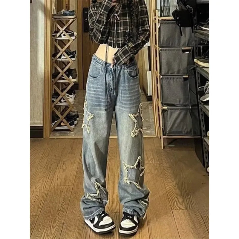 Blue high-waist wide-leg denim jeans showing straight cut design on mannequin