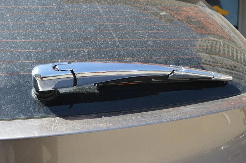 Four silvery ABS plastic rear wiper blade cover trims for a 2010 Hyundai car