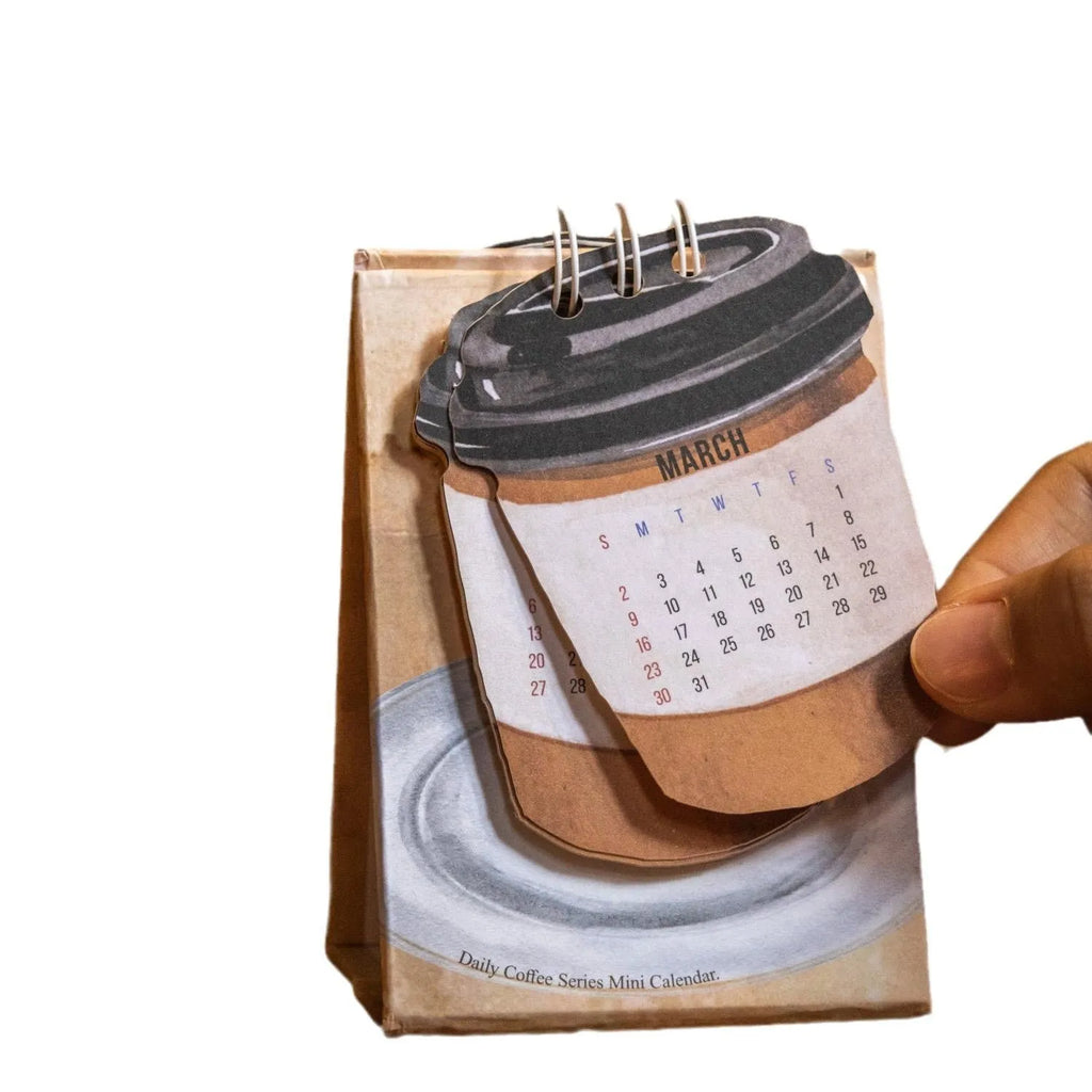 Mini 2025 desk calendar showing coffee theme with motivational design