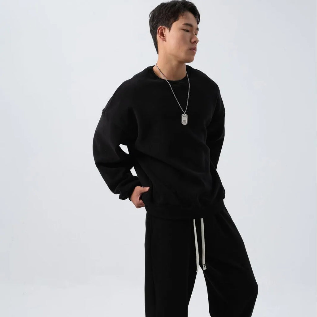 Men's polar fleece suit set showing crew neck jacket and padded trousers in five winter colour options