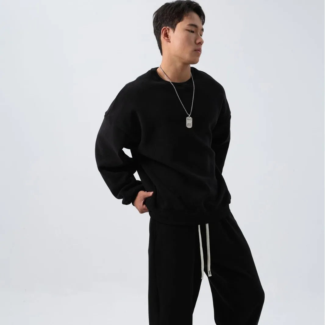 Men's polar fleece suit set showing crew neck jacket and padded trousers in five winter colour options
