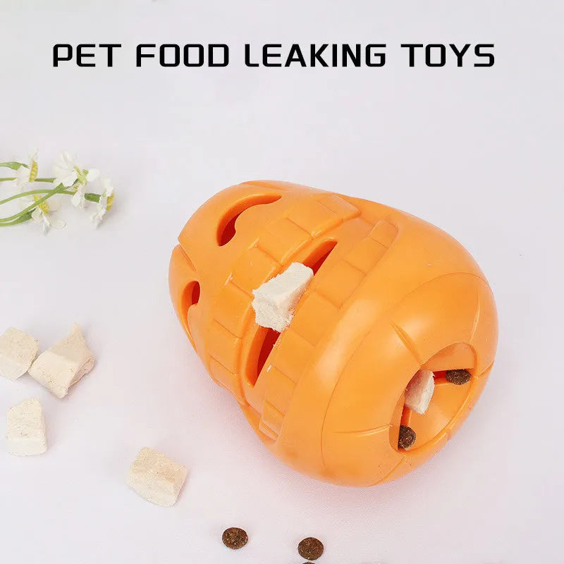 Red and orange Halloween pumpkin shaped interactive dog chew toy on a white background.